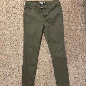 green skinny jeans
